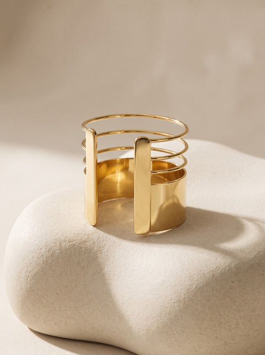 Gold-plated cut-out cuff by DERAC