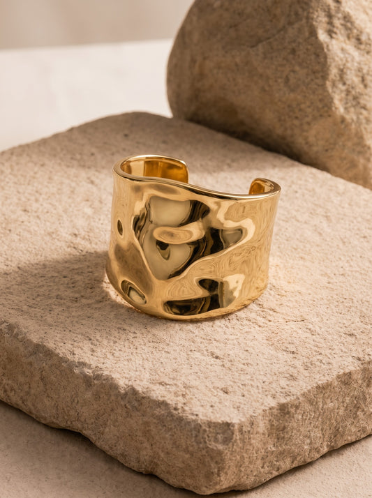 Molten gold-plated statement cuff by DERAC